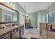 Large bathroom with double vanity, walk-in shower, and tile floors at 598 Barnwood Dr, Rockmart, GA 30153