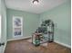 This bedroom could also be used as an office and features carpet floors and a window at 598 Barnwood Dr, Rockmart, GA 30153
