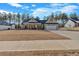 Attractive single-story home with a two-car garage, front porch, and a spacious front yard in a neighborhood at 598 Barnwood Dr, Rockmart, GA 30153