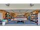 Inside view of garage with tool storage, workbench and burgundy colored auto at 598 Barnwood Dr, Rockmart, GA 30153