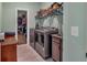 Laundry room with stainless steel appliances and ample shelving for storage at 598 Barnwood Dr, Rockmart, GA 30153