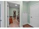 Laundry room with washer, dryer, utility sink, and access to walk-in closet at 598 Barnwood Dr, Rockmart, GA 30153