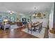 This spacious open-concept living and dining area has hardwood floors and natural light at 598 Barnwood Dr, Rockmart, GA 30153