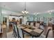 The dining and living spaces feature hardwood floors and an open layout at 598 Barnwood Dr, Rockmart, GA 30153