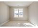 Bedroom featuring a window that offers natural light and views of the neighborhood at 108 Redford Ln, Canton, GA 30115