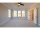 Bedroom with multiple windows, carpet, and view of the ensuite bath at 108 Redford Ln, Canton, GA 30115