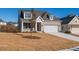 Charming brick home featuring a two-car garage and neutral-colored exterior at 108 Redford Ln, Canton, GA 30115