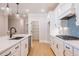 Modern kitchen with stainless steel appliances, stylish countertops, and ample cabinet space at 108 Redford Ln, Canton, GA 30115