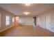 Open living space with hardwood flooring, neutral walls, large windows, and recessed lighting at 108 Redford Ln, Canton, GA 30115