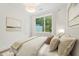 Relaxing bedroom with neutral tones, soft lighting, and comfortable furnishings at 1171 Lupo Loop, Chattahoochee Hills, GA 30268