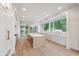 Gourmet kitchen featuring a large island, custom cabinets, and high-end appliances at 1171 Lupo Loop, Chattahoochee Hills, GA 30268