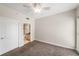 Bedroom featuring carpet, a ceiling fan, and access to a bathroom at 195 14Th Ne St # 1404, Atlanta, GA 30309
