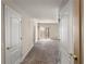 Bright living room boasts neutral walls, carpet floors, and a sliding glass door to a balcony at 195 14Th Ne St # 1404, Atlanta, GA 30309