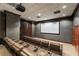 Private theater room with leather recliners, projector, and screen at 195 14Th Ne St # 1404, Atlanta, GA 30309