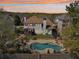Aerial view of a home with a backyard featuring a pool, patio, well-maintained lawn, and mature trees at 3530 Horizon Ct, Cumming, GA 30041