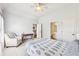 Spacious bedroom with an ensuite bathroom and comfortable seating area by the window at 3530 Horizon Ct, Cumming, GA 30041
