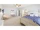 Bright bedroom features a ceiling fan, stylish furnishings, and ample space for study and rest at 3530 Horizon Ct, Cumming, GA 30041