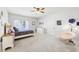Cozy bedroom with plush chair, decor, window, and carpeted flooring at 3530 Horizon Ct, Cumming, GA 30041