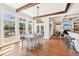 Dining area with view to the backyard, breakfast bar and sitting room at 3530 Horizon Ct, Cumming, GA 30041