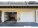 Two-car garage with ample storage space and an organized tool rack, providing convenient parking at 39 Paces West Nw Dr, Atlanta, GA 30327