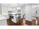 Modern kitchen featuring stainless steel appliances, a center island, and ample white cabinetry at 39 Paces West Nw Dr, Atlanta, GA 30327