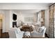 Comfortable living room with a fireplace, soft lighting, and stylish decor create a relaxing ambiance at 39 Paces West Nw Dr, Atlanta, GA 30327
