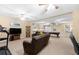 Finished basement with pool table, TV, leather couch, and memorabilia at 9246 W Banks Mill Rd, Winston, GA 30187