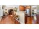 Kitchen with breakfast bar open to the living room and stainless steel appliances at 9246 W Banks Mill Rd, Winston, GA 30187