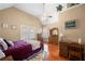 Tranquil main bedroom with vaulted ceilings, hardwood floors and lots of natural light at 9246 W Banks Mill Rd, Winston, GA 30187