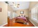 Spacious main bedroom with hardwood floors, vaulted ceilings, and comfortable decor at 9246 W Banks Mill Rd, Winston, GA 30187