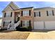 Beautiful two-story home featuring stone accents and a well-maintained front yard at 252 Berkley Dr, Villa Rica, GA 30180