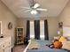 Bright bedroom featuring vaulted ceilings and a ceiling fan at 252 Berkley Dr, Villa Rica, GA 30180