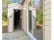 Exterior shot of an outdoor storage shed with a concrete base next to the home at 7613 Suwannee Ct, Jonesboro, GA 30236