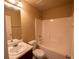 Bathroom boasts a shower and bathtub combination, perfect for a relaxing bath at 85 Providence Pkwy, Covington, GA 30014