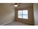 Bedroom with neutral walls, carpeted floor, ceiling fan and one window at 85 Providence Pkwy, Covington, GA 30014