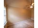 Spacious bedroom with neutral walls and ceiling fan, perfect for relaxation at 85 Providence Pkwy, Covington, GA 30014