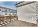 Wooden deck with railing overlooking the complex at 145 Laurel Crest Aly, Johns Creek, GA 30024