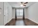 Bright, spacious bedroom with hardwood floors, a window, and ample closet space; a serene retreat at 145 Laurel Crest Aly, Johns Creek, GA 30024