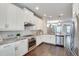 Well-appointed kitchen with stainless steel appliances and granite countertops at 145 Laurel Crest Aly, Johns Creek, GA 30024