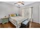 Bedroom featuring hardwood floors, ceiling fan and natural light at 358 Woodbrook Crst, Canton, GA 30114