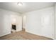 Bedroom with attached vanity area, neutral walls, and plush carpeting for comfort and style at 71 Pulaski Ave, Hampton, GA 30228