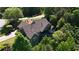Secluded home featuring rear screened in porch, surrounded by lush trees and landscaping at 11 York Trce, Cartersville, GA 30121