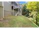 Multi-level deck and landscaped backyard, perfect for outdoor enjoyment and entertaining with natural surroundings at 11 York Trce, Cartersville, GA 30121