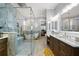 An elegant bathroom featuring a modern shower with glass enclosure, soaking tub, and double sink vanity at 11 York Trce, Cartersville, GA 30121