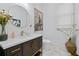 Stylish powder room with modern vanity, marble countertop, and designer fixtures at 11 York Trce, Cartersville, GA 30121