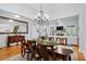 Elegant dining room with hardwood floors, chandelier, and view into the living room at 11 York Trce, Cartersville, GA 30121