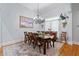 Elegant dining room featuring a chandelier, hardwood floors, and a spacious layout for entertaining at 11 York Trce, Cartersville, GA 30121