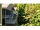 Multi-level deck offering a serene outdoor living space surrounded by lush greenery at 11 York Trce, Cartersville, GA 30121
