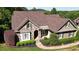 Charming home featuring a stone facade, landscaped yard, and a well-maintained lawn at 11 York Trce, Cartersville, GA 30121