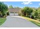 Beautiful home featuring a long driveway, manicured lawn, and attached two-car garage in a picturesque setting at 11 York Trce, Cartersville, GA 30121